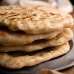 pile of flatbread in an iron plate.