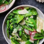 two bowls of spring salad with mint-lemon dressing.