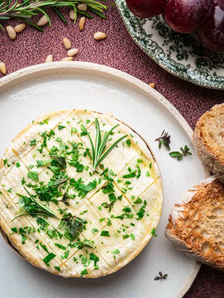 Garlic Baked Brie With Herbs And Pine Nuts | Nim Pairings