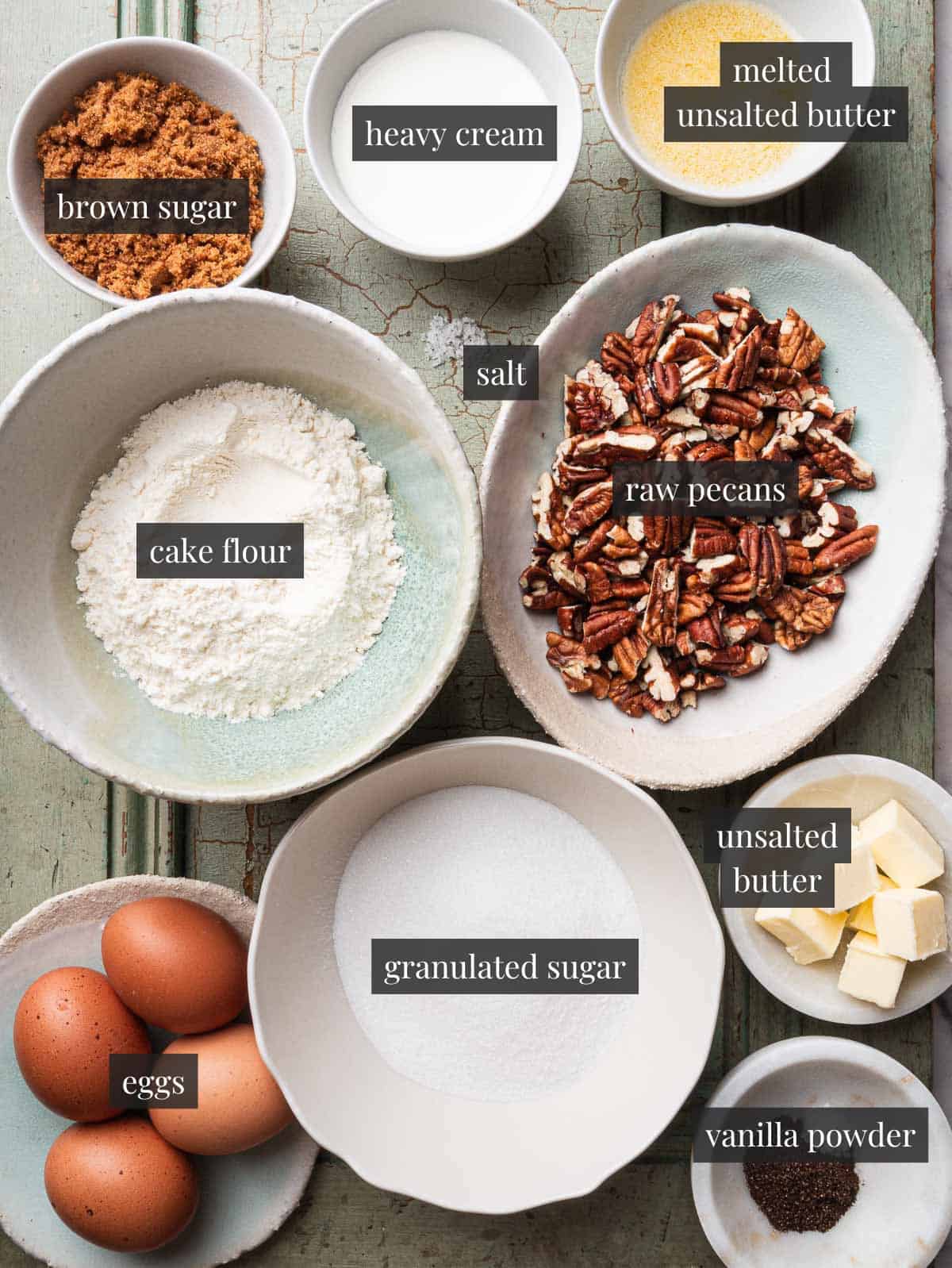 pecan, brown sugar, heavy cream, melted butter, flour, sugar, eggs, butter, vanilla powder and salt.