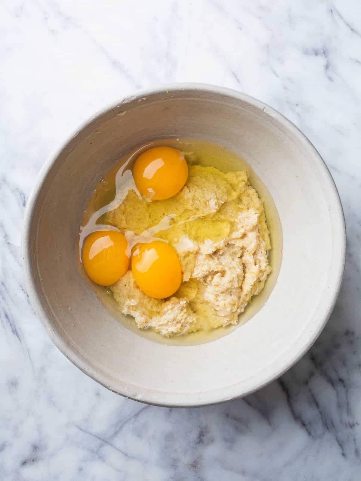 egg on top of butter sugar lemon zest mixture.