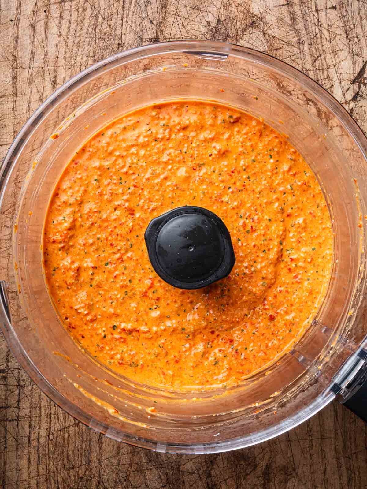 Feta and red pepper dip in a food processor.