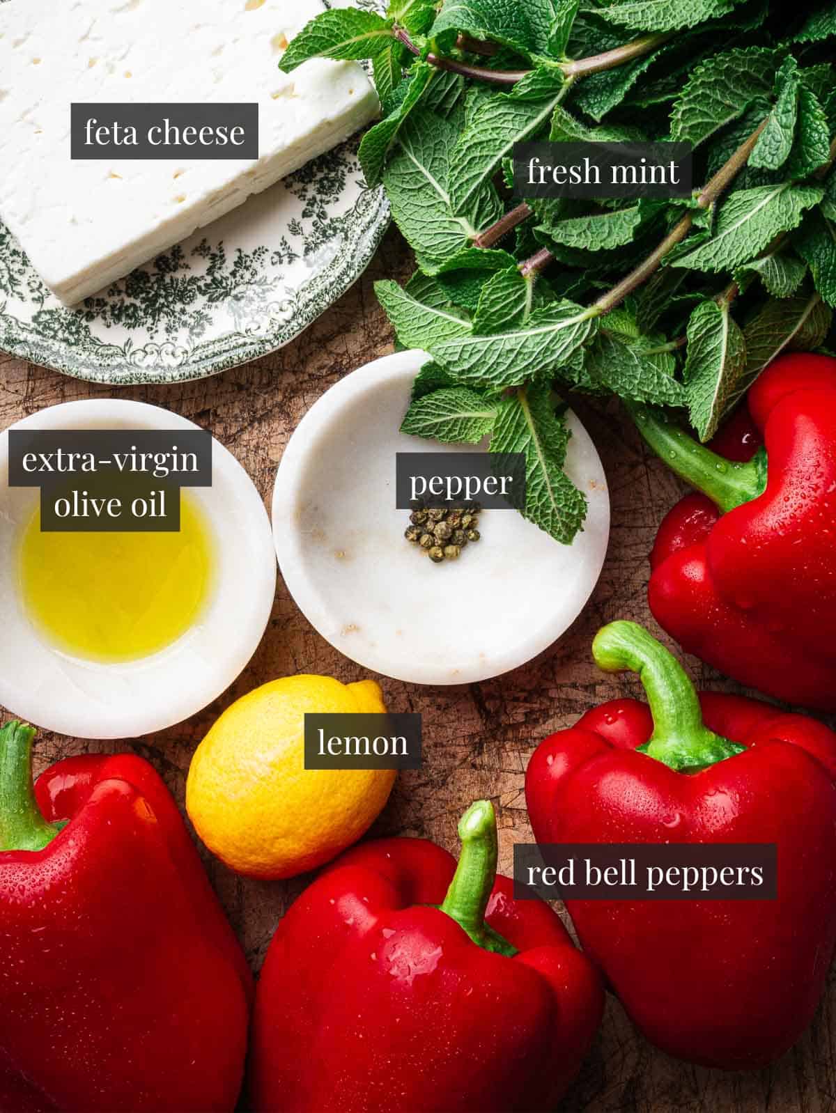 Four red bell peppers, feta cheese, fresh mint, lemon, olive oil and pepper.