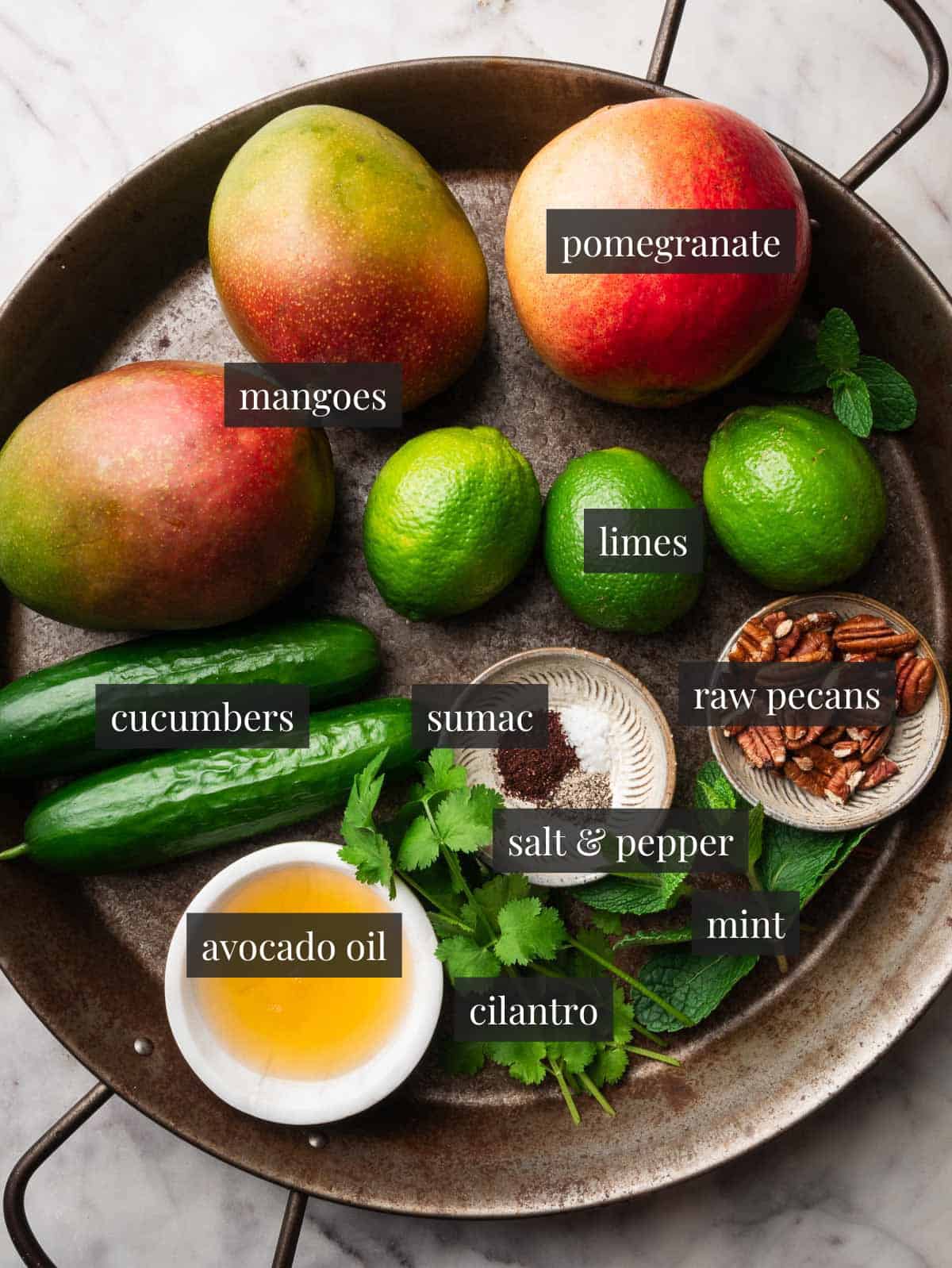 Mangoes, cucumbers, limes, pecans, avocado oil, mint, cilantro, sumac, salt and pepper.