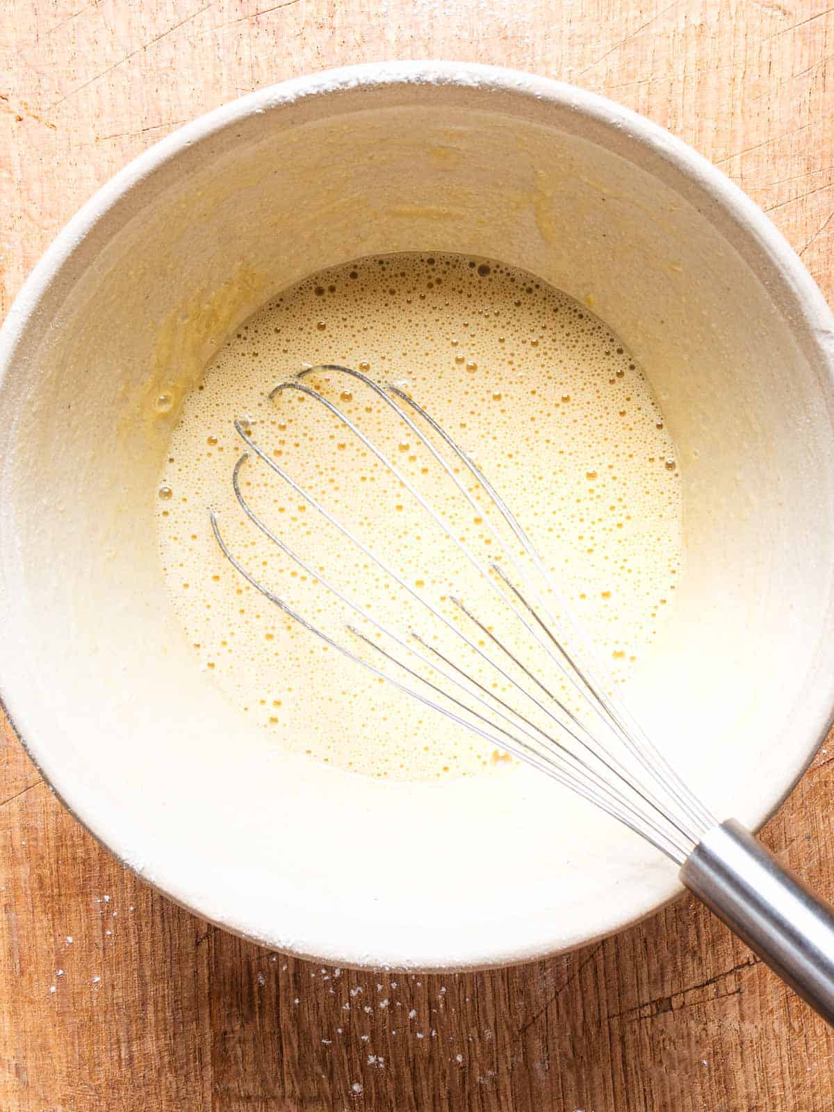 Eggs, sugar and flour batter in a bowl.